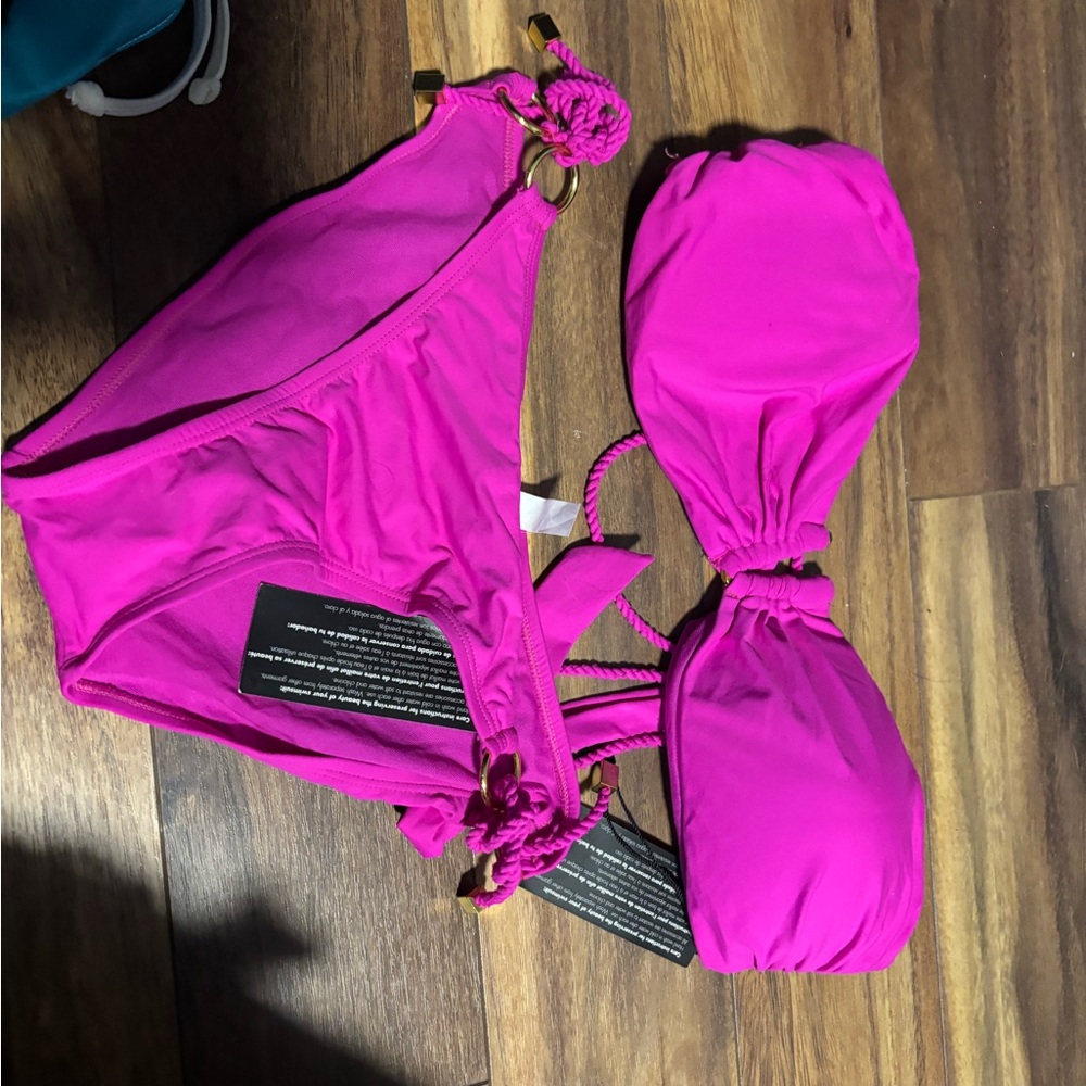NWT bikini.  Top is large and bottom is Xs.
